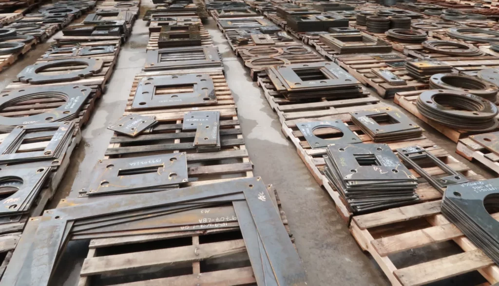 Pallets of finished custom-cut plate orders staged for shipment in the Madden Bolt yard