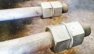 Custom anchor bolts with color-coded ASTM F1554 grade markings